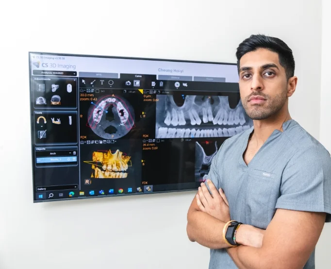 Implant dentist reviewing a digital dental scan at Didcot Dental Studio